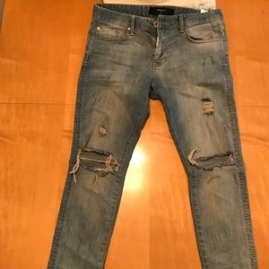 Represent clothing distressed light wash jeans